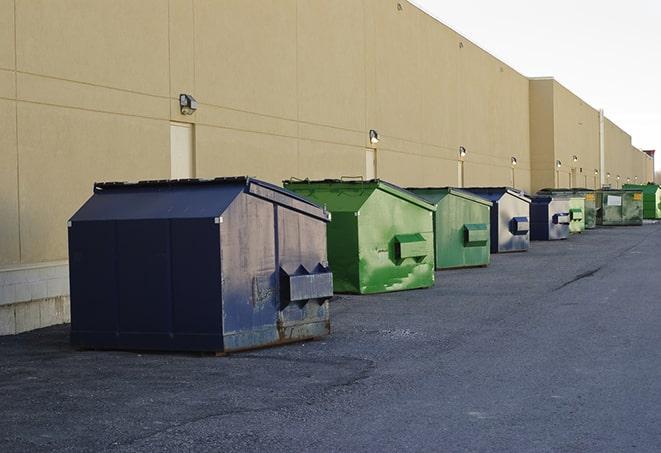 waste collection receptacles placed near a worksite in Edgewood